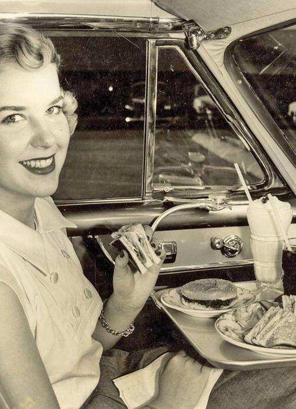 Drive-in movie theater offers dinner and a movie experience in 1952.
