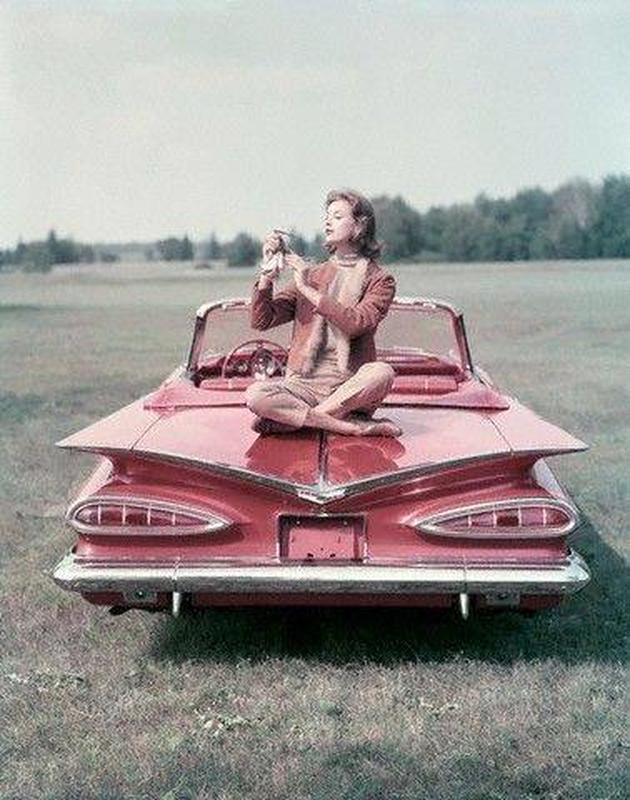 Introducing a 1959 Pink Chevrolet Impala Convertible: A Classic Ride for Women