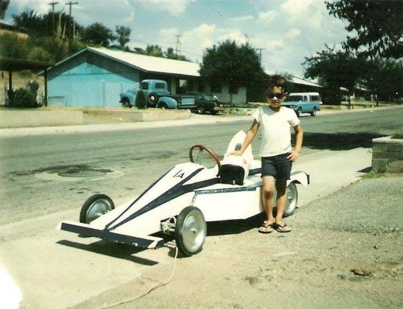 A Classic Throwback: Kid Poses with His Soap Box Derby Car in 1978