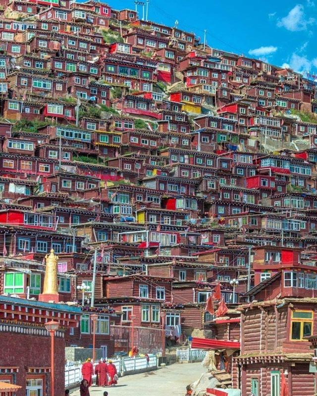 🏔 Majestic Peaks Embrace Tibet's Mountain Village