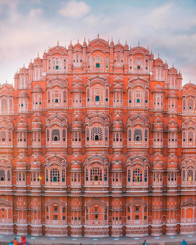 Hawa Mahal palace in Jaipur, India constructed with red and pink sandstone.