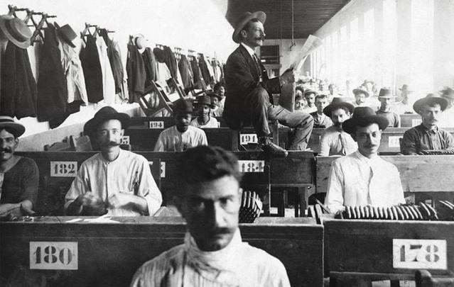 Workers in the late 19th and early 20th century factories were employed to read newspapers, poetry, or novels to combat workers' boredom.