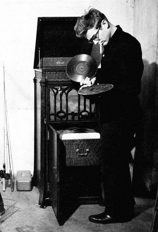 James Dean browsing through vinyl records in the 1950s.