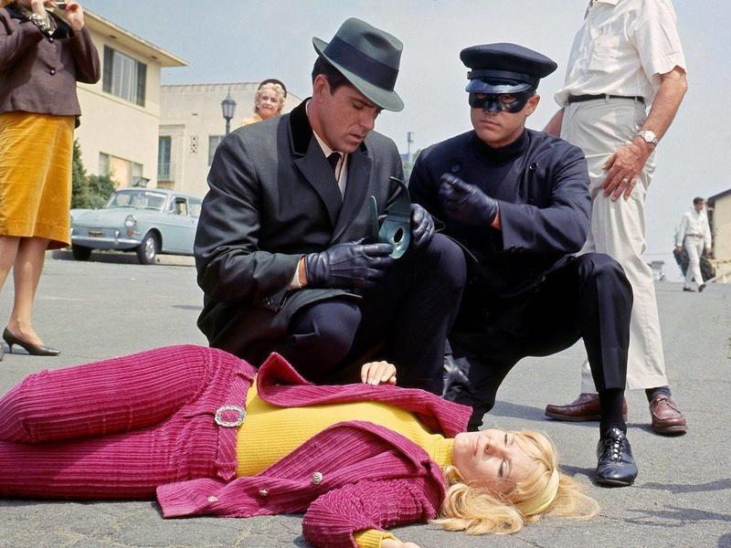 Van Williams and Bruce Lee star in a captivating scene from their iconic TV series, 'The Green Hornet' from 1966.