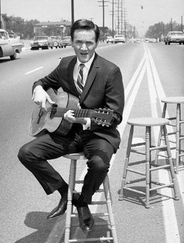 King of the Road' by Roger Miller became a major crossover hit in 1964