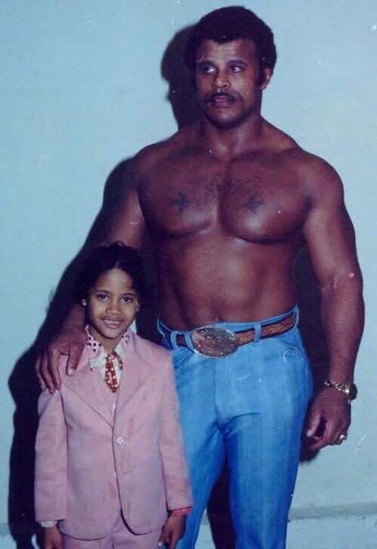 Little Dwayne 'The Rock' Johnson and his father, pro wrestler Rocky Johnson, captured in a snapshot from 1981.