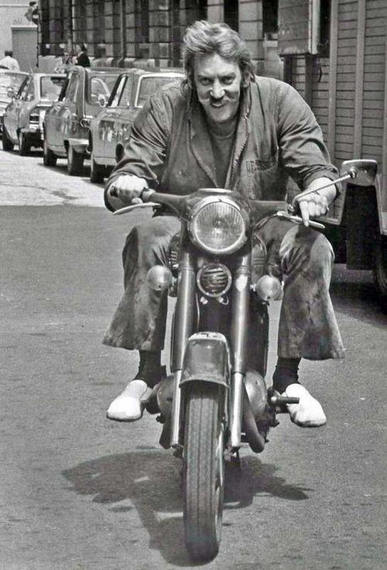 Actor Donald Sutherland Riding a Triumph Motorcycle