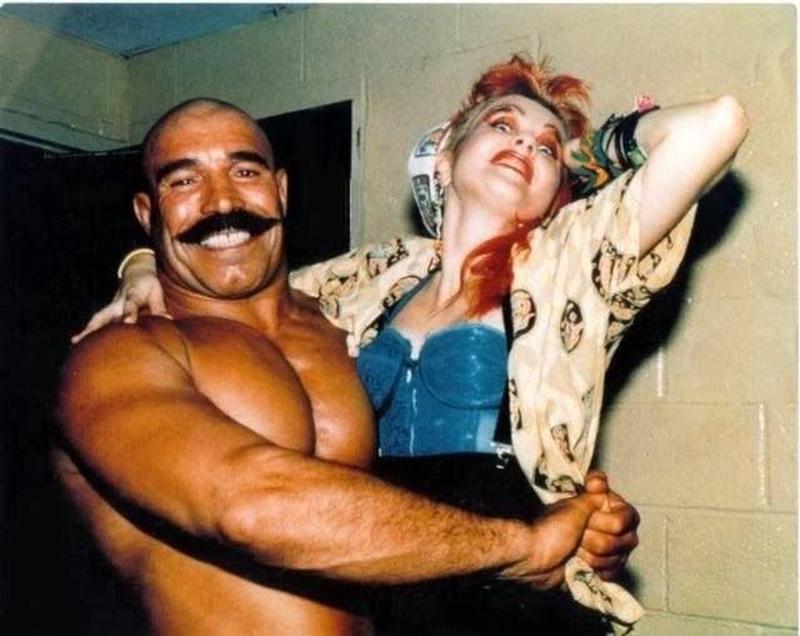The Iron Sheik and Cyndi Lauper having fun during the filming of 'The Goonies 'R' Good Enough' music video in 1985.