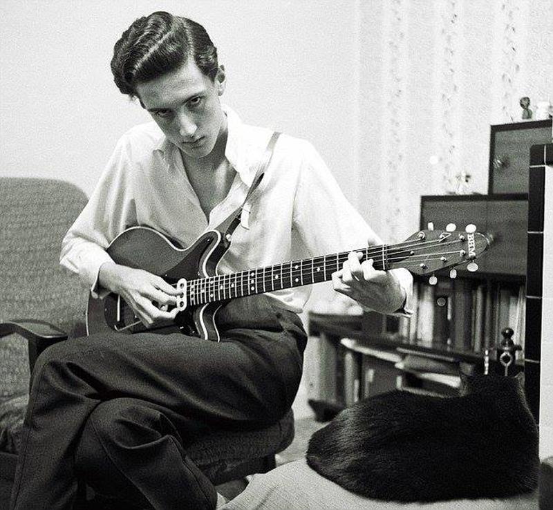 In 1963, 16-Year-Old Brian May Poses with Red Special Guitar Crafted from 18th Century Fireplace Wood