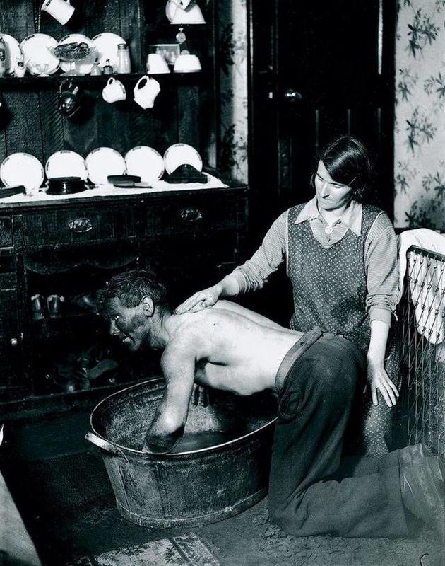 1931: Welsh Woman Baths Her Husband Who Works in the Mines