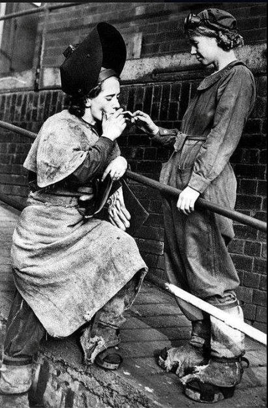 1942: Female Steel Workers Take a Well-Deserved Break Amidst War