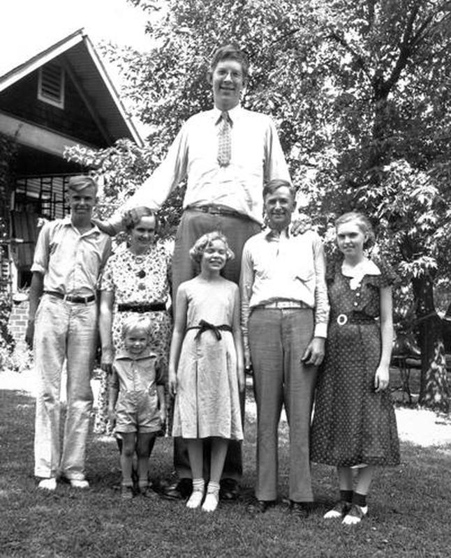 Family of Robert Wadlow, the tallest man in recorded history, pictured together in 1935 at a staggering height of 8 feet, 11.1 inches.