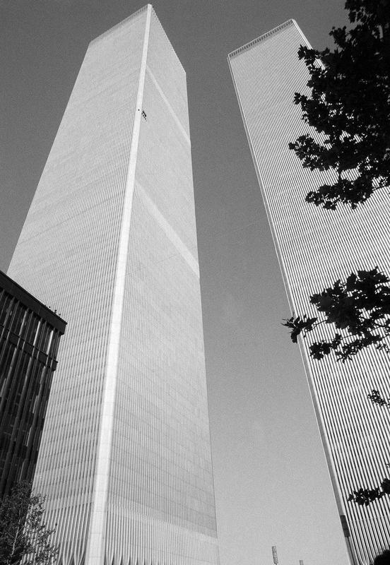 George Willig, known as the 'Human Fly,' successfully scales the World Trade Center's South Tower in 1977, but is arrested and fined $1.10 by the city - a penny for each floor he conquered during the 3.5-hour climb.