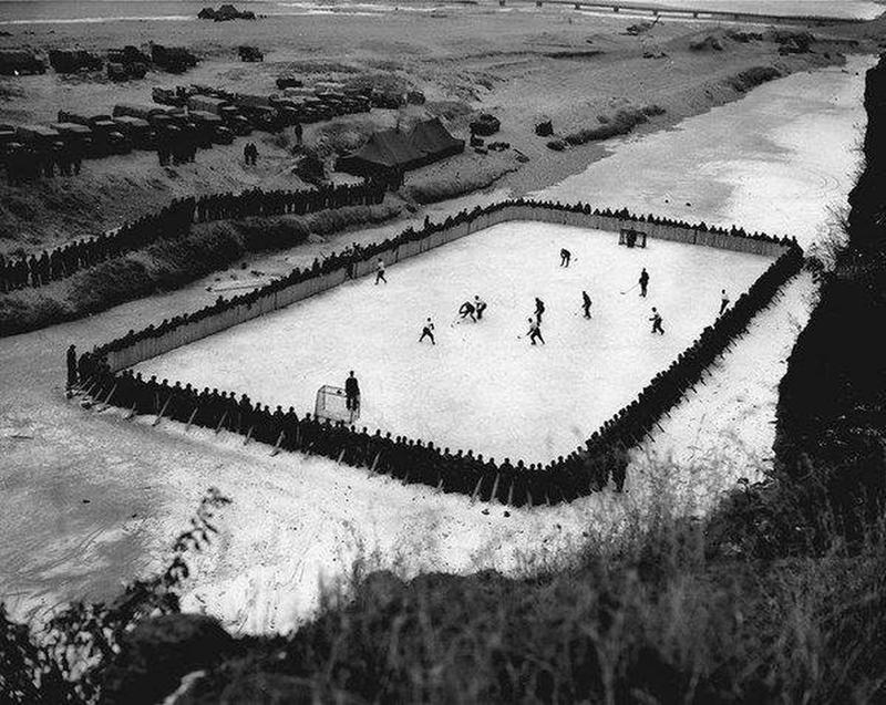 Canadian soldiers in Korea construct hockey rink during their service in 1952.