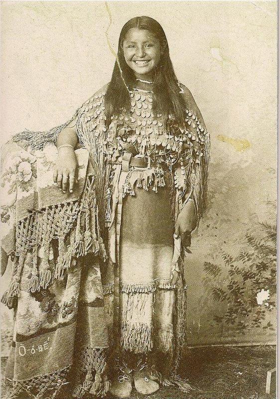 1894 photograph showcases a Native American girl exuding pure joy