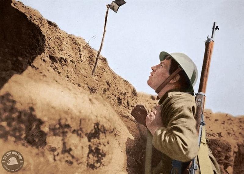 Soldier takes cover in a trench during the Battle of the Somme in 1916