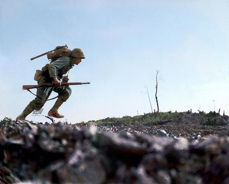 Brave US Marine Embarks on Perilous Journey Through Japanese Fire in Okinawa, Japan - June 7, 1945