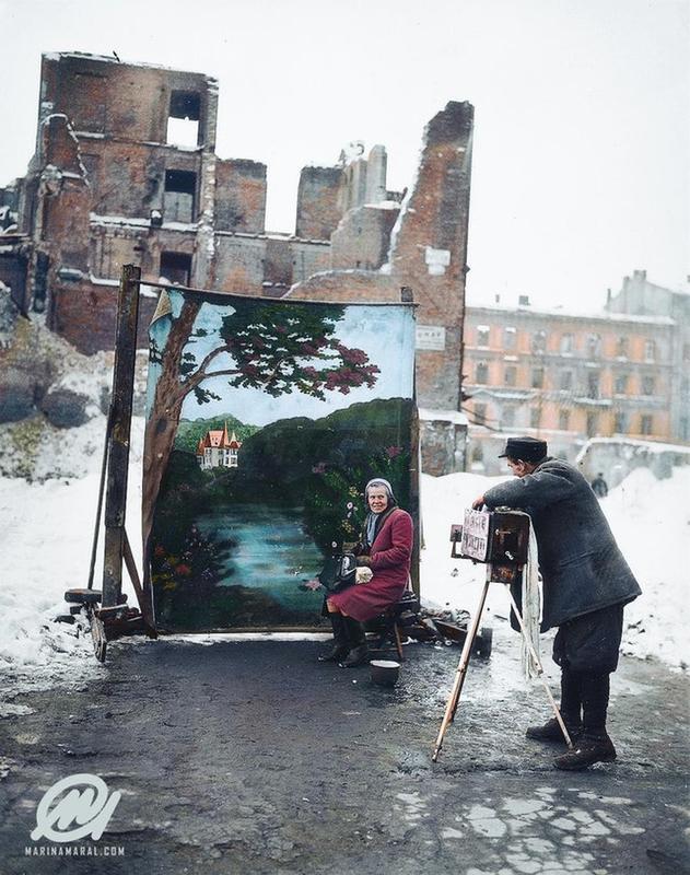 Photographer ingeniously covers up post-World War II ruins in Warsaw with self-made backdrop for a portrait shoot, November 1946