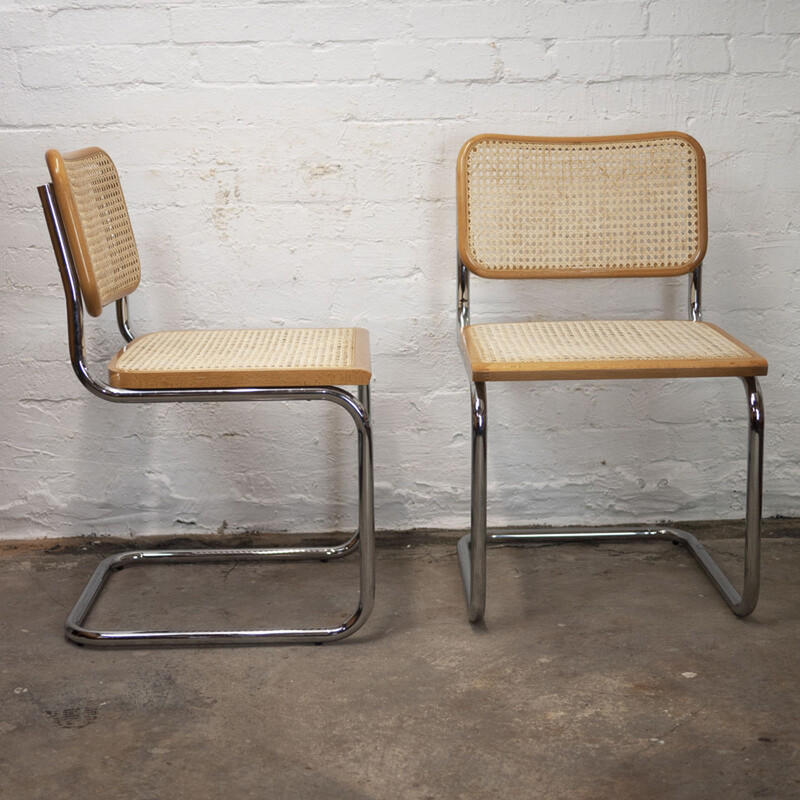 80s Trendy Cane Wood and Chrome Chairs Lose Popularity, Transforming into Nostalgic Remnants of a Bygone Era, Stirring Fond Memories for '80s Children.