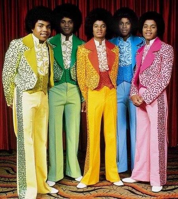 The Jackson 5 in colorful tuxedos, captured in the 1970s!