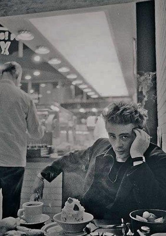 James Dean's iconic serious and sexy look captured at a 1950s diner