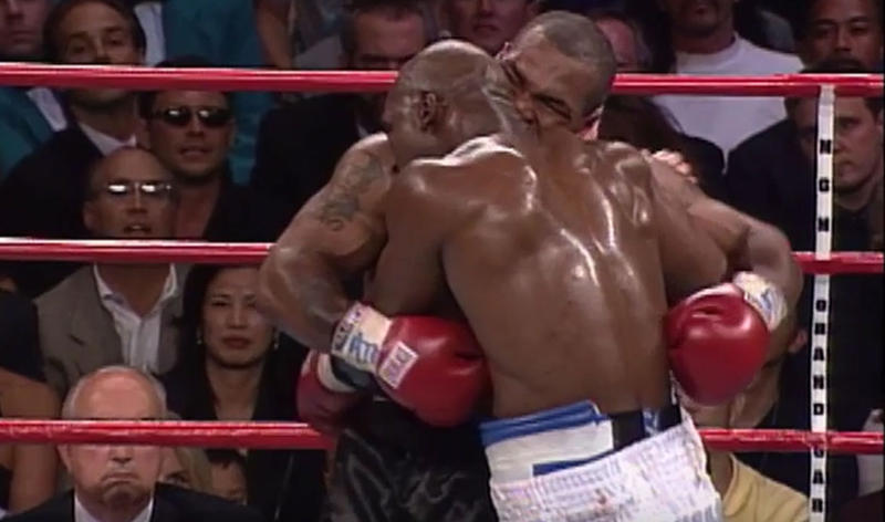 Mike Tyson Takes a Chunk of Evander Holyfield's Ear with His Teeth on June 28, 1997
