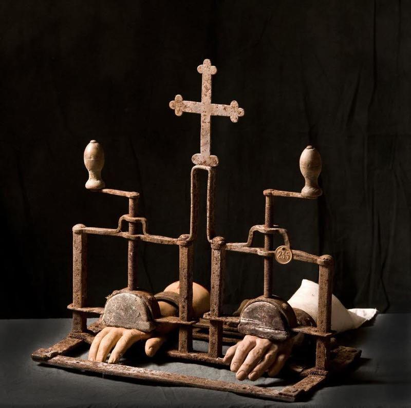 Catholic Church's 15th century hand crushing machine disciplined "greedy hands".