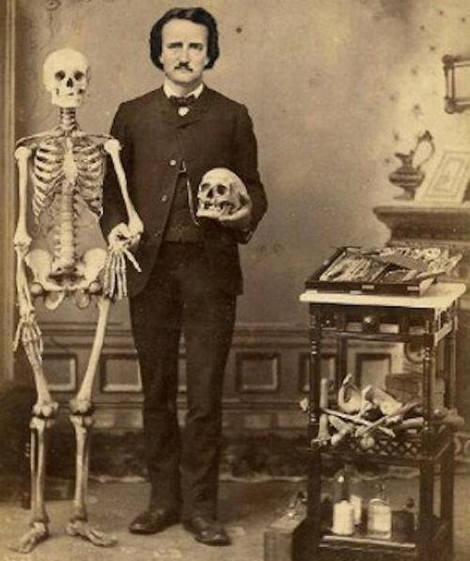 Edgar Allan Poe embraces the macabre, posing with skull and skeleton circa 1840.