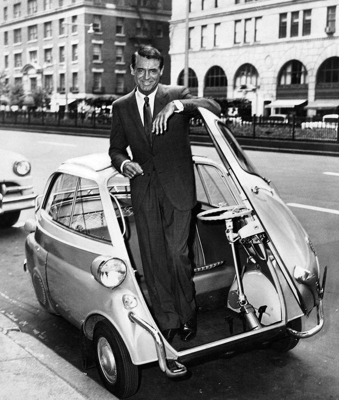 Pose captured of Cary Grant with the 1960 BMW Isetta '300' vehicle.