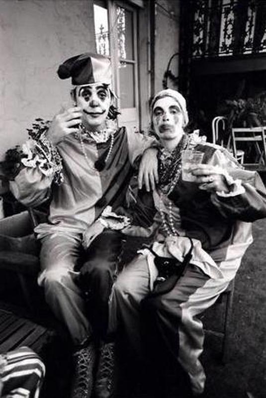 Paul and Linda McCartney don festive clown attire for 1975 Mardi Gras celebrations.