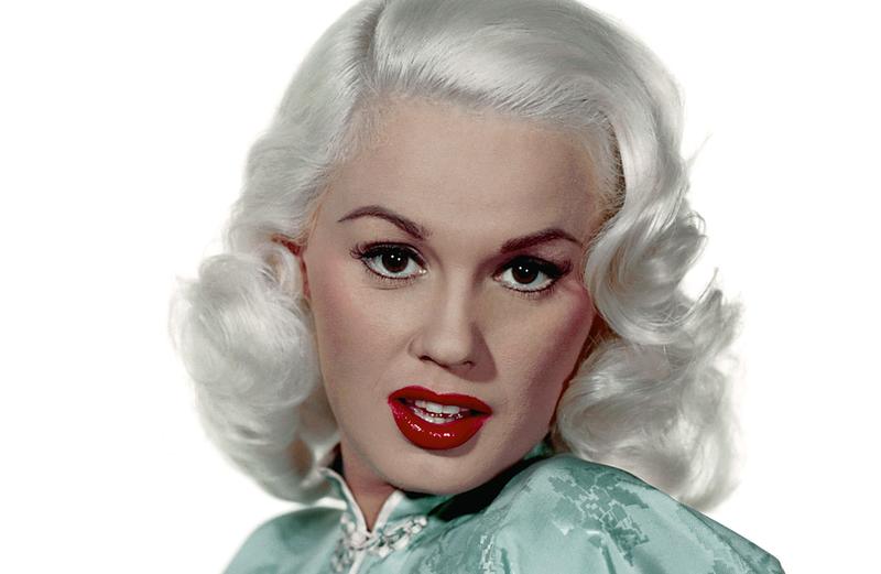 Mamie Van Doren, a model and actress, exudes glamour in the 1950s.