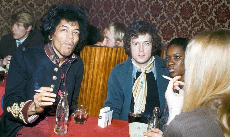 Iconic Guitarists Jimi Hendrix and Eric Clapton Socialize in 1960s London