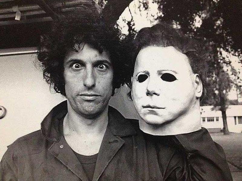 Nick Castle, donning his iconic 'Michael Myers' mask, captured in a behind-the-scenes moment on the set of 1978's 'Halloween'.