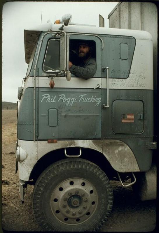 Experienced truck driver proudly displays his favorite vehicle