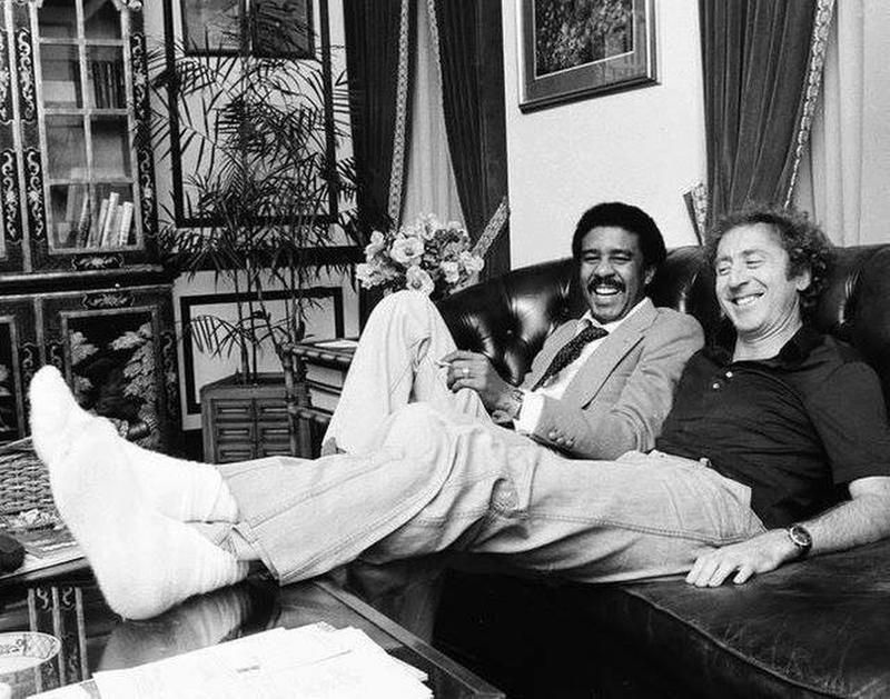 Gene Wilder and Richard Pryor share a laugh during the 1989 filming of 'See No Evil, Hear No Evil'.