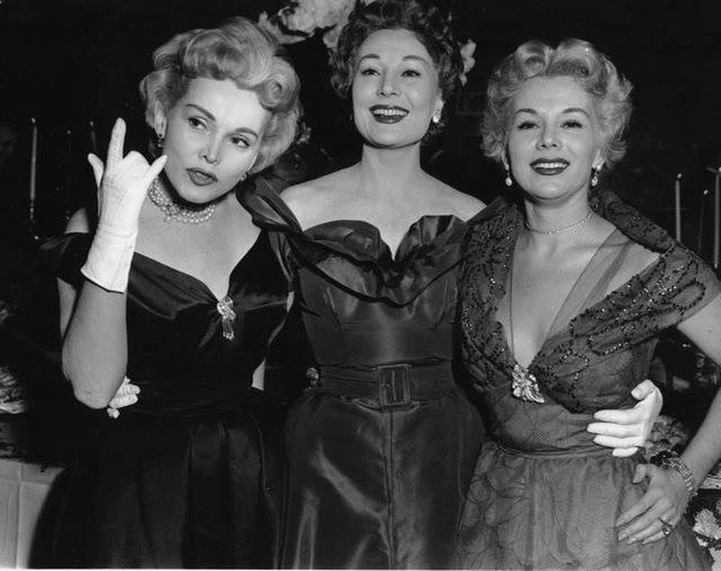 Zsa Zsa, Magda, and Eva Gabor grace a glamorous cocktail party in Las Vegas, 1955.
