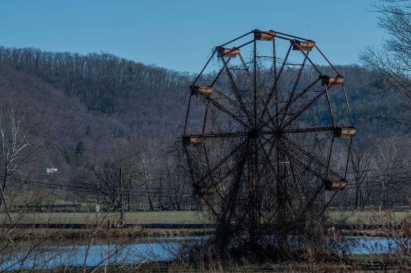 West Virginia amusement park, infamous for a bloody history, shuts down in 1966 and remains abandoned.