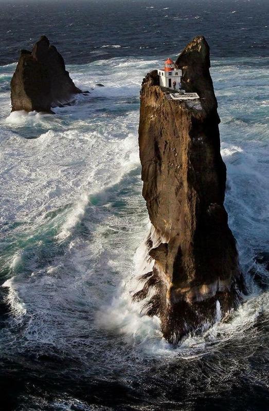 The Prídrangaviti Lighthouse: An Isolated Marvel Perched on a Rock Pillar in Iceland's Westman Islands