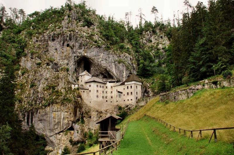 Slovenia's Predjama Castle Abides Within Postojna Cave
